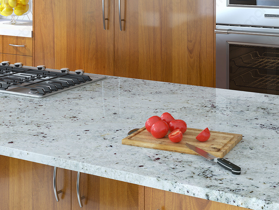 protecting the granite countertop by using a cutting board to prepare food