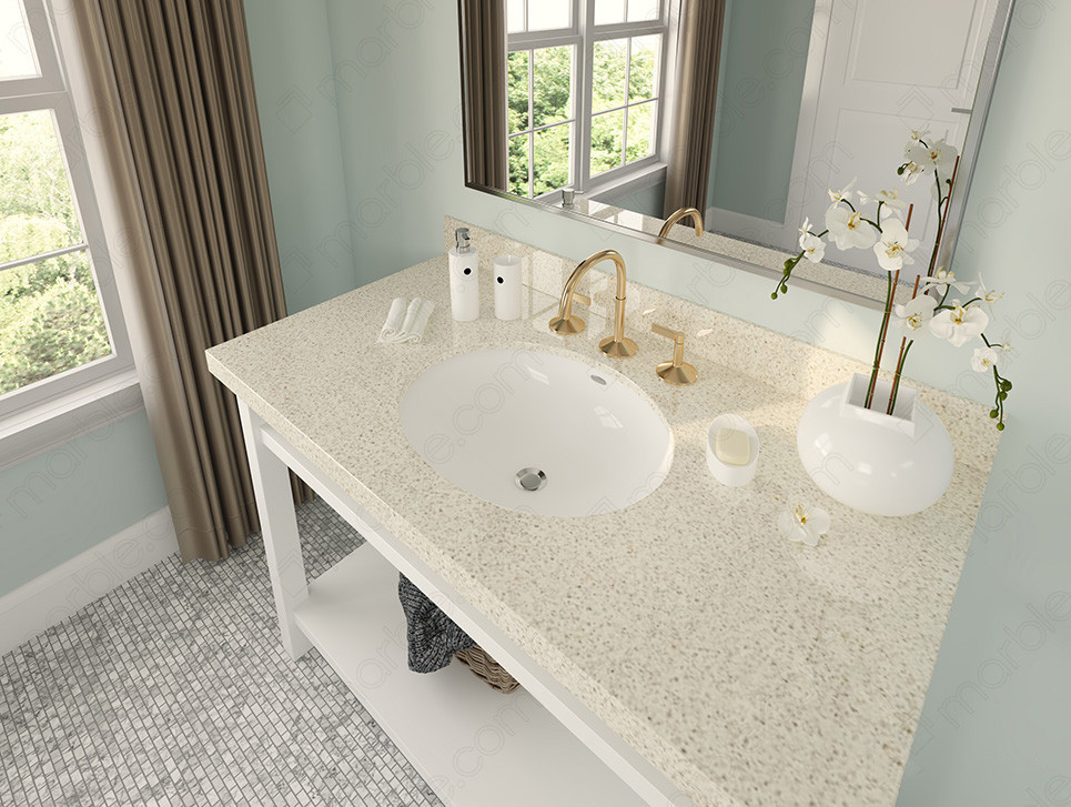 Bathroom has cream quartz countertop and gold faucet