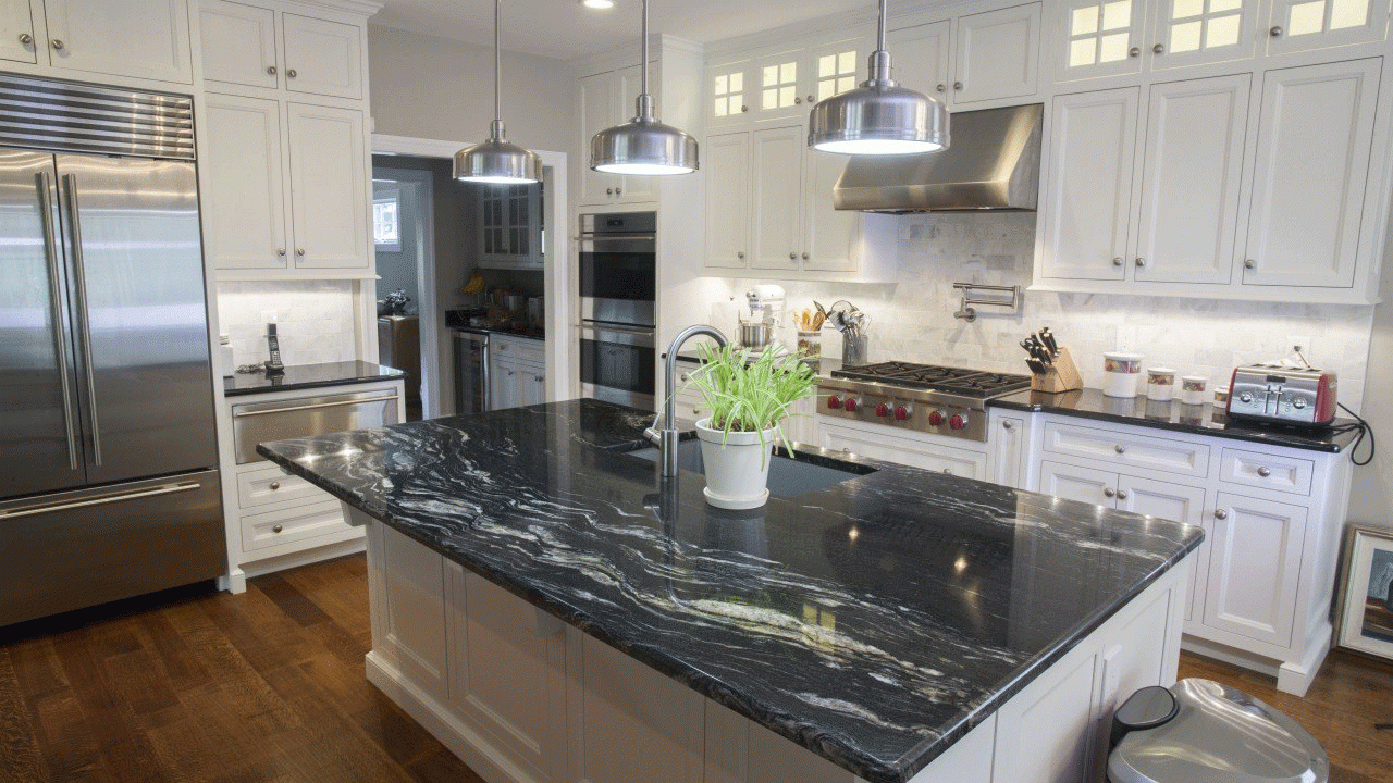 grey bar in kitchen with black granite top