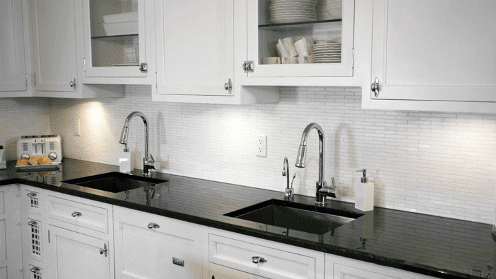 black kitchen countertop with drop in sink