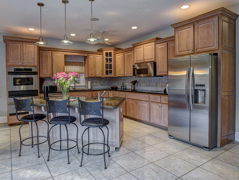 Beautiful Granite Counters to Pair with Oak Cabinets image