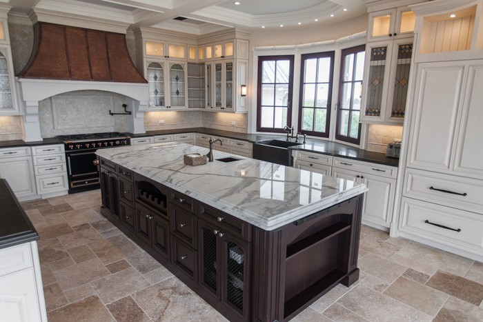 Mixing Up Kitchen Countertop Colors Design Ideas Calcatta Extra Marble Kitchen Island Countertop With Contrasting Dark Granite Countertops