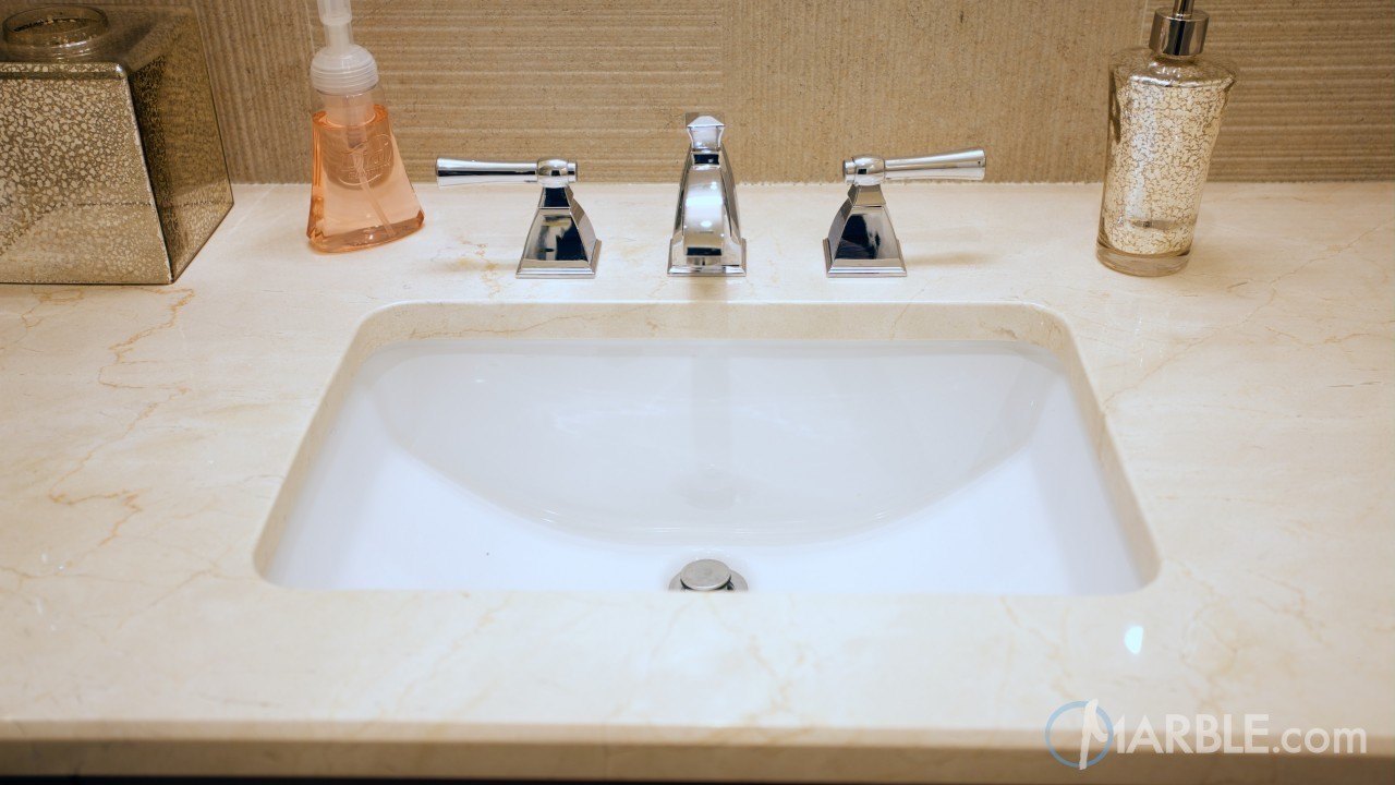 Crema Marfil Marble Countertop In A Classic Bathroom Marble Com