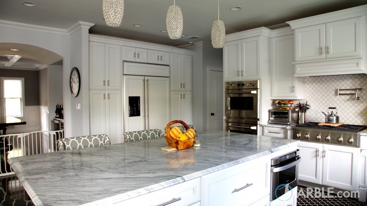 Super White Quartzite Countertops In An Elegant Kitchen Marble Com