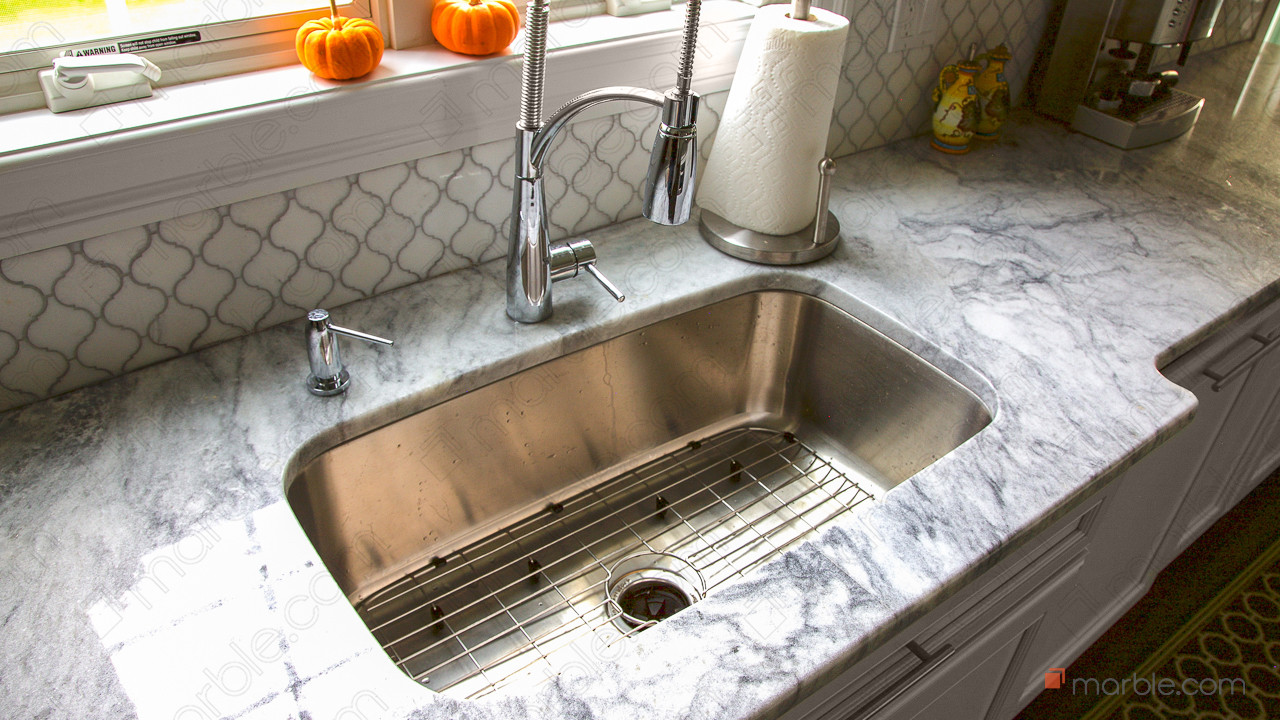 Super White Quartzite Countertops In An Elegant Kitchen