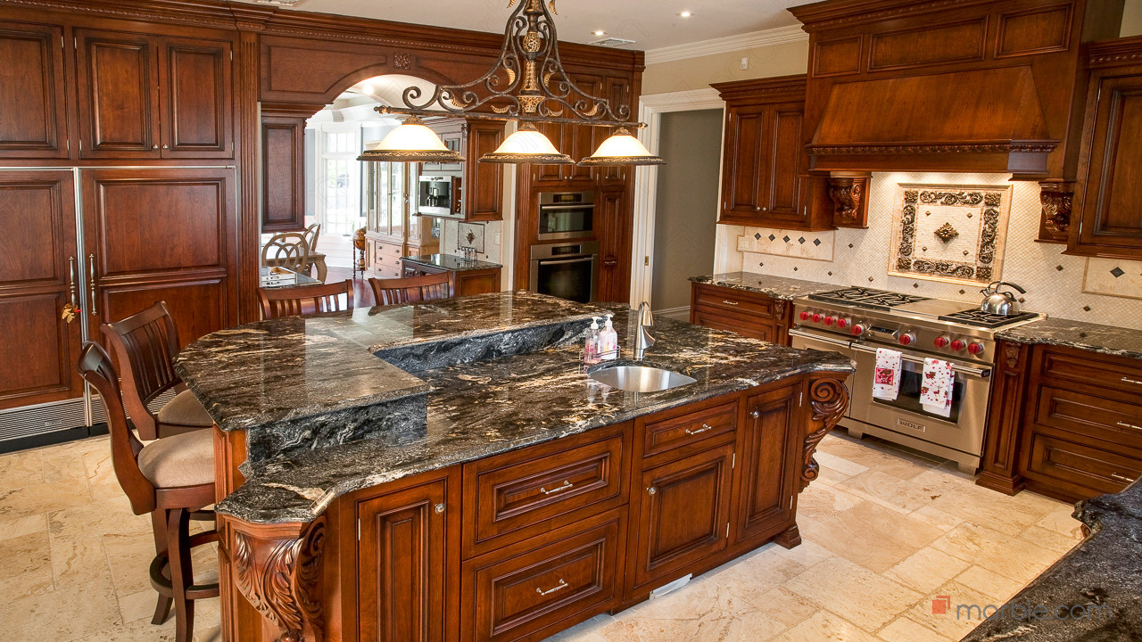 Cosmic Black Granite Kitchen Countertops With A Multi-Layer Island | Marble.com