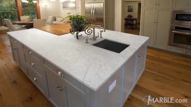 White Carrara Marble & Oscuro Mist Satin Granite Kitchen Countertops