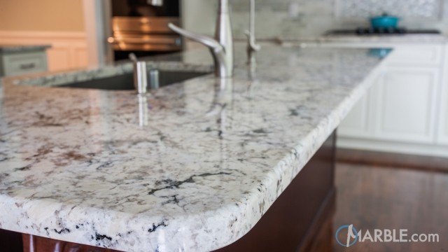 Snow White Granite Counters, Countertops, Bar tops, Vanities - Snow White Granite installed. Image. Image