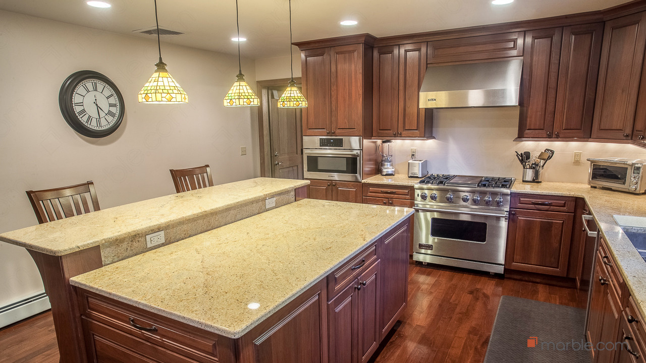 Madura Gold Granite Kitchen Countertop & Two Tier Island | Marble.com