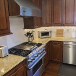 Madura Gold Granite Kitchen Countertop & Two Tier Island | Marble.com